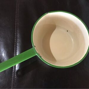 Antique Cream and Green Kettle.  Has a small tiny hole in the bottom.